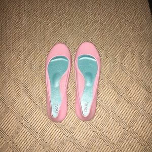 Barbie pink rubber shoes.